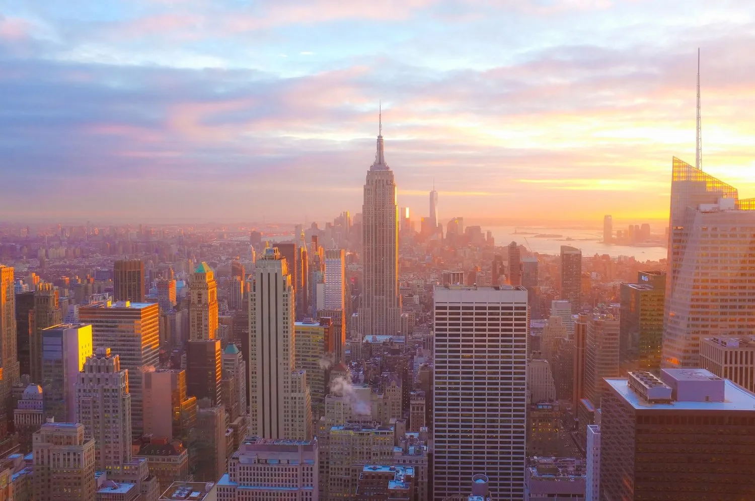 Manhattan skyline at sunset with the Empire State Building