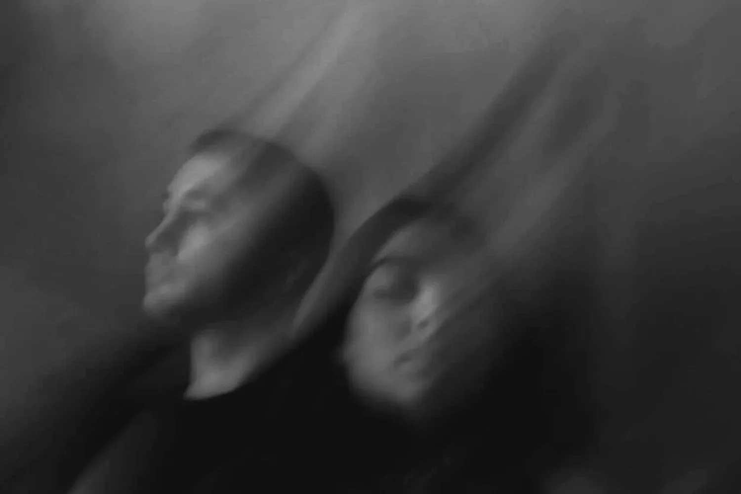 Blurred double-exposure portrait of a person’s face