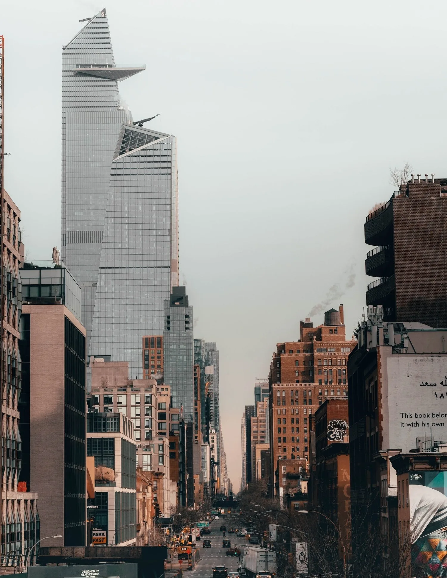Tall buildings lining a busy New York City street