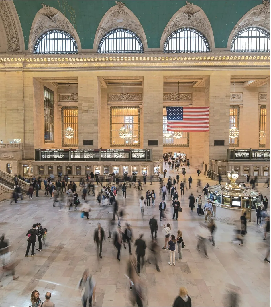 Busy crowd moving through the main concourse of Grand Central Terminal