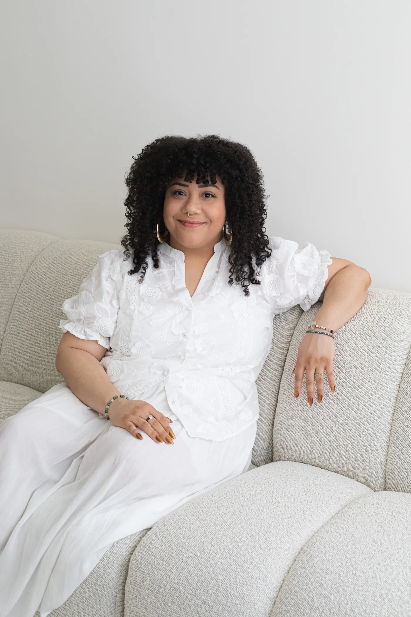 A person seated, warm and at ease